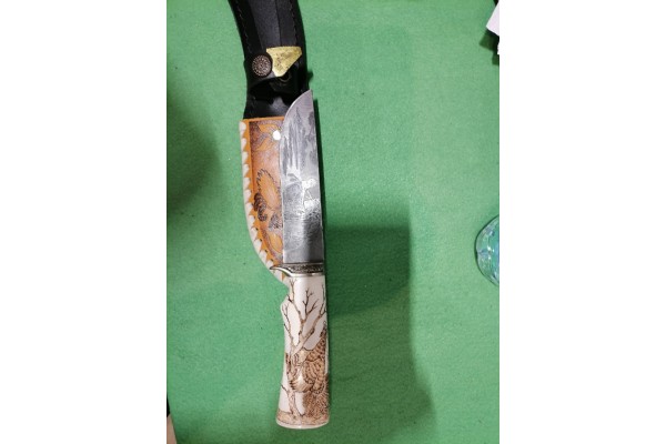 Купить кованый нож Носорог из Дамаска